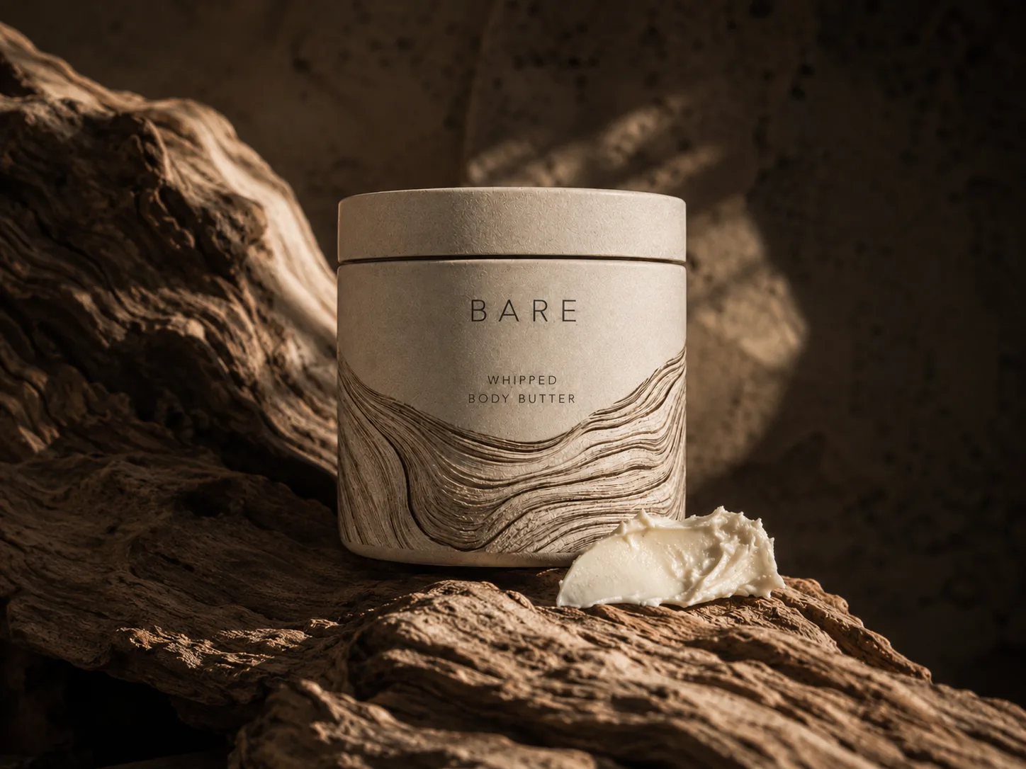 Bare clay renewal mask with leaf-vein packaging styled on stone