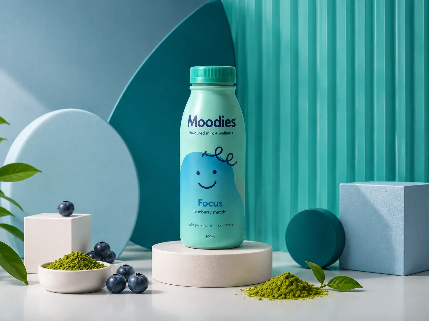 Moodies bottle surrounded by fresh ingredients in an immersive flavour-led campaign shot