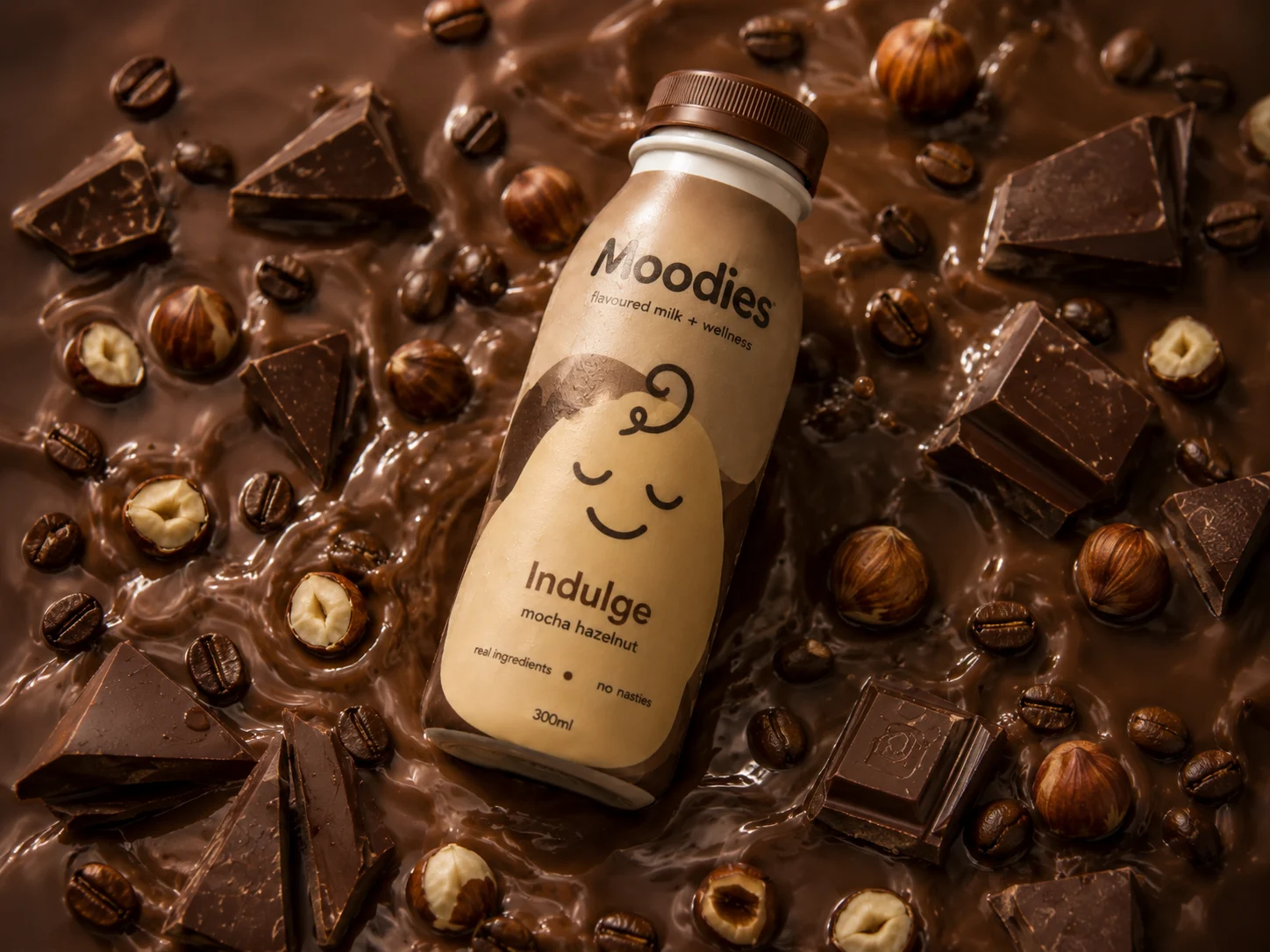 Moodies bottle in a flavour-led studio composition with fresh fruit and colour